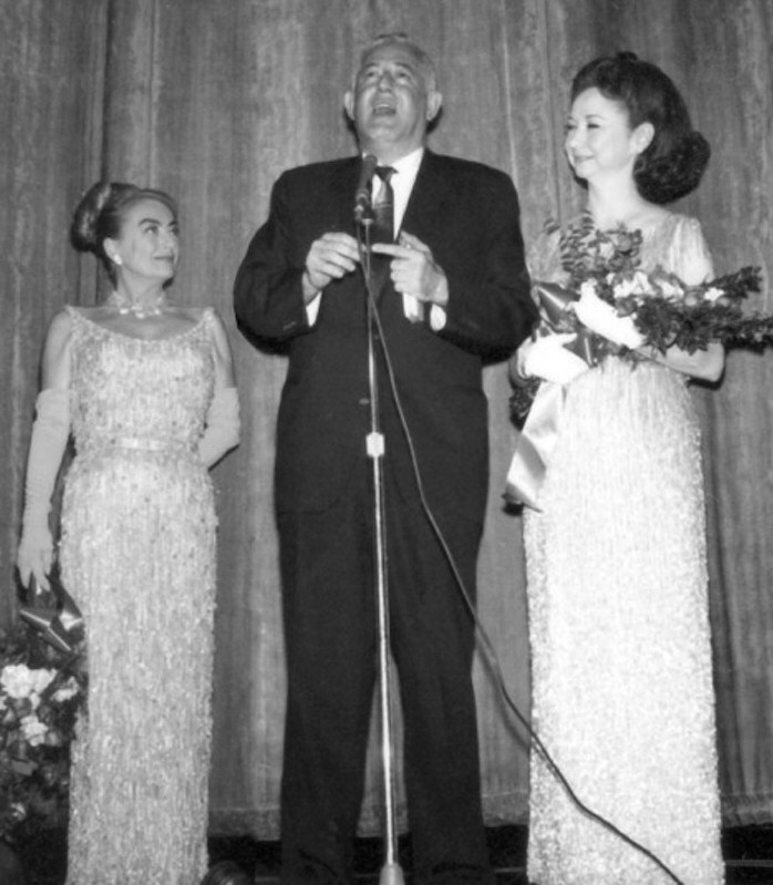 1/24/64. At a promotional event for 'Strait-Jacket' in Harlem, with William Castle and Dorothy Kilgallen.