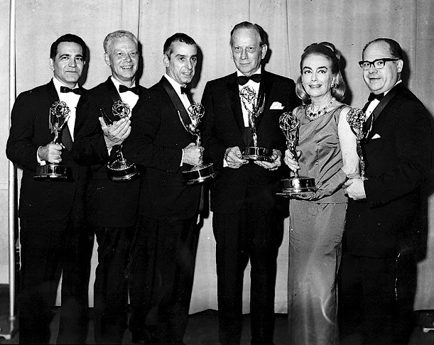 At the 9/13/65 Emmys with Melvyn Douglas and award winners.