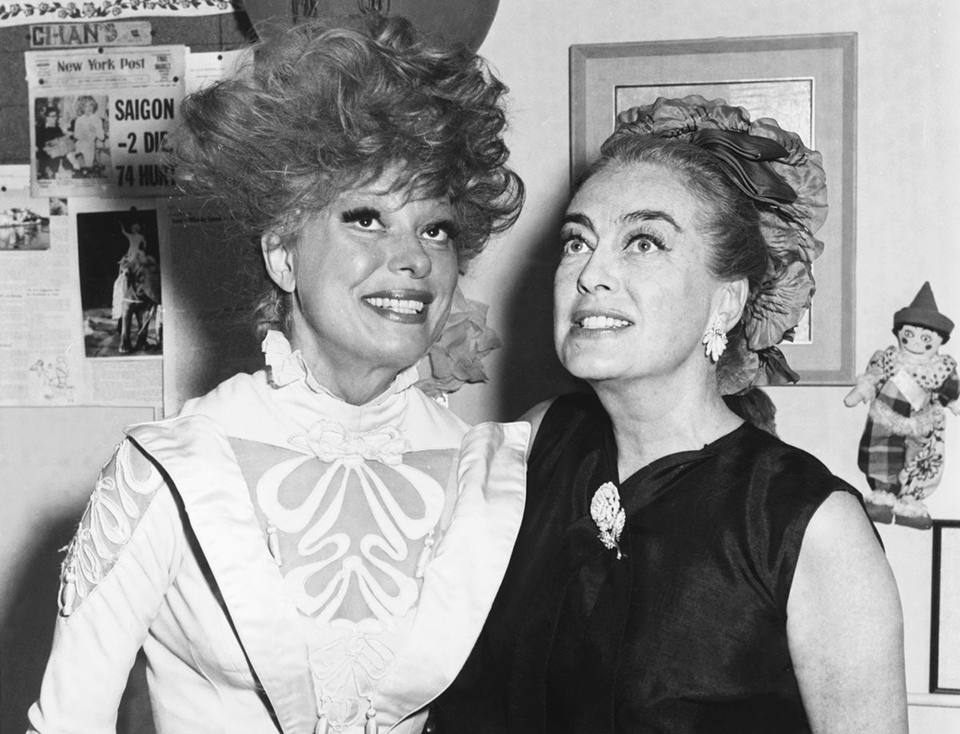 June 17, 1965. Joan with Carol Channing backstage at 'Hello Dolly!'