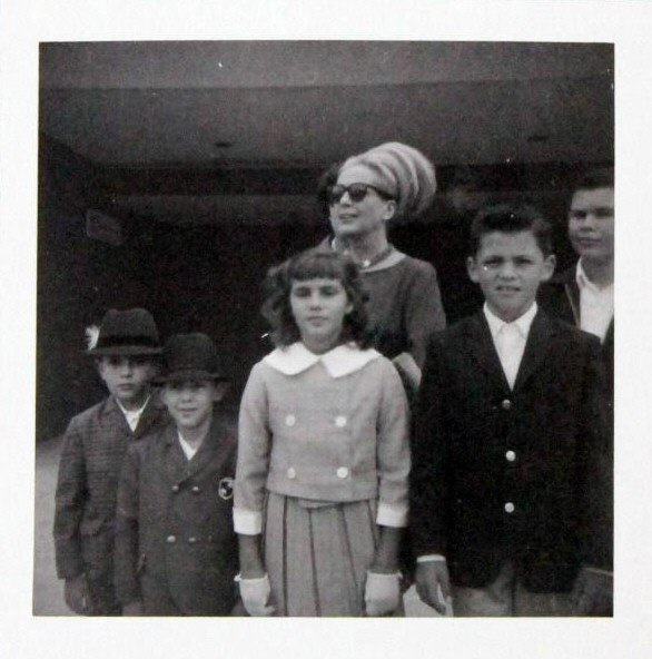 1965. Candid with 'the White Family' at LAX.