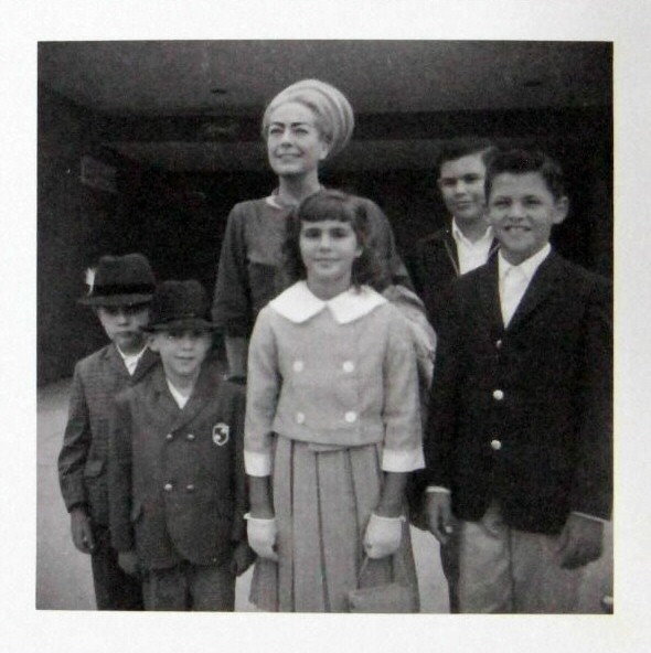 1965. Candid with 'the White Family' at LAX.