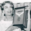 3/2/65. Receiving the 'Woman of the Year' award from NYC's USO.