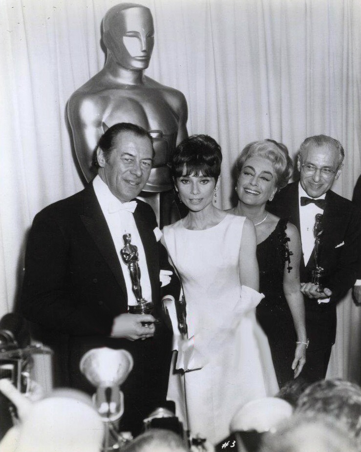 At the 4/5/65 Oscars with Rex Harrison, Audrey Hepburn, and George Cukor.