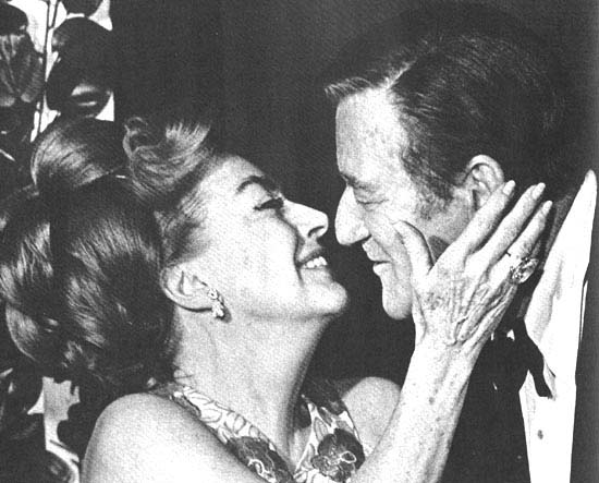 At the 1970 Golden Globes, with John Wayne.