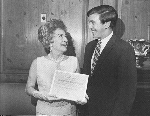 3/18/70. Receiving a 'Ten Outstanding Women of Business' award from the Anchor mutual funds group.