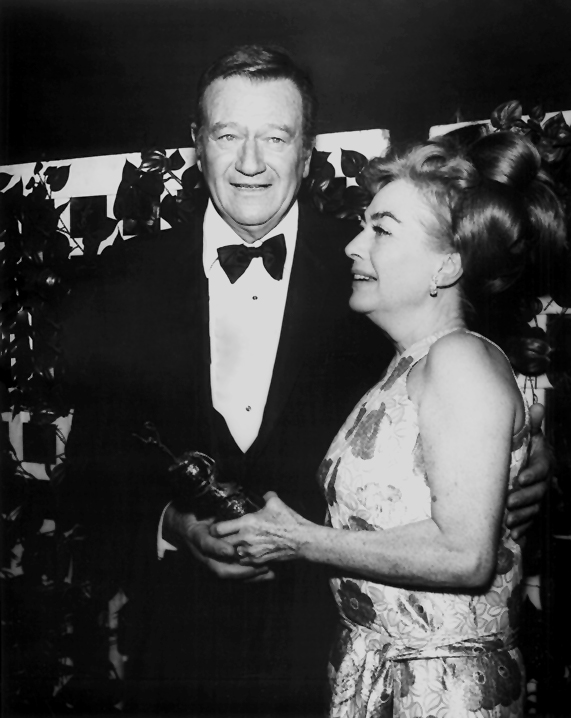 2/3/70. At the Golden Globes with John Wayne. (Thanks to Bryan Johnson.)