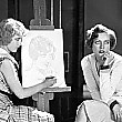 1929, being sketched by 'Our Modern Maidens' co-star Anita Page.