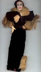 1932 Letty Lynton promotional doll by Mary Green. 11 inches tall. Wire, cloth, oil-painted face with jewelled shoes.