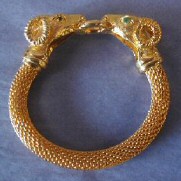 Joan's faux gold ram-headed bracelet. From the William Wilt collection.