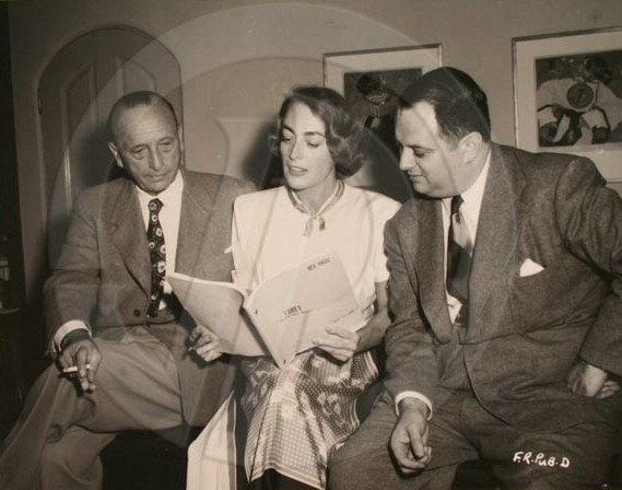 On the 'Flamingo' set, with Mike Curtiz, left.
