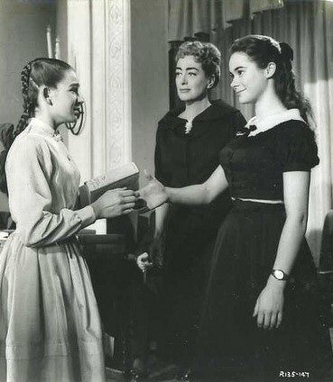 1957. 'Esther Costello.' With Heather Sears (right).