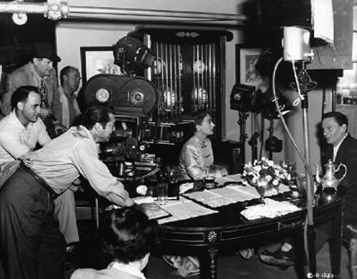 1950. On the set of 'Harriet Craig.'