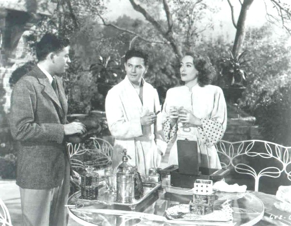 With Oscar Levant, left, and John Garfield.