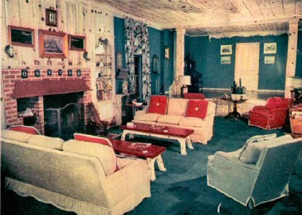 Joan Crawford's private theater is in a small building alongside the pool. It's as well-equipped as any full-sized theater, and movies are shown here almost every night. The stage is at the far end of the beautifully-furnished room. 