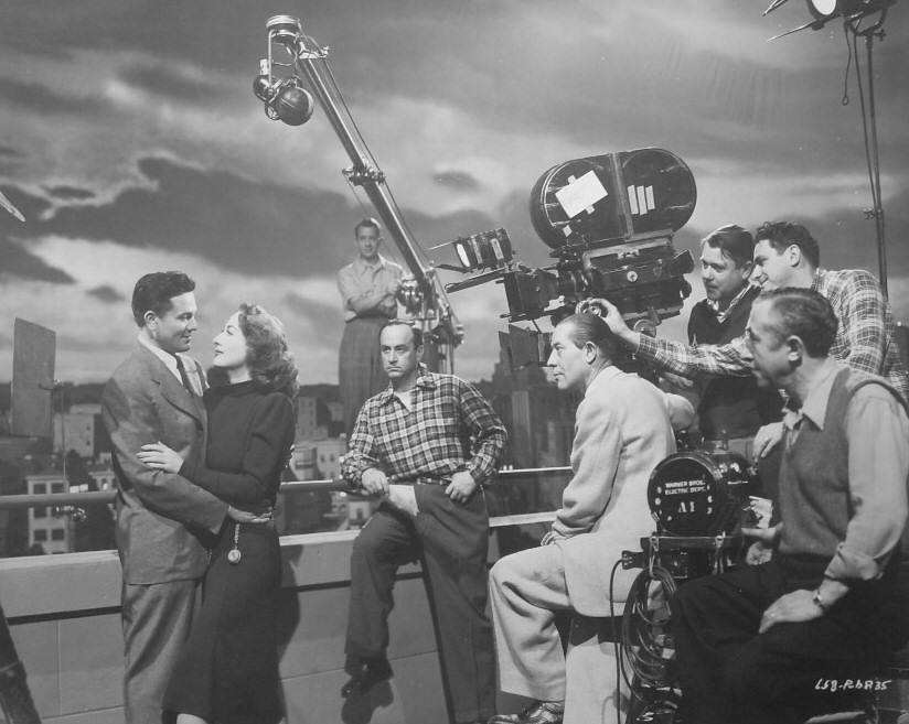 1946. On the set of 'Humoresque' with John Garfield and crew.