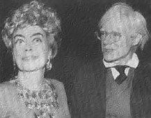 Joan and Warhol at the Rainbow Room, 1974.