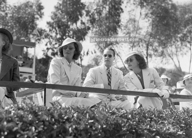 July 23, 1936. At a polo match with Barbara Stanwyck and Franchot Tone.