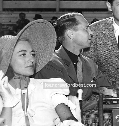 July 1938, with husband Franchot Tone.