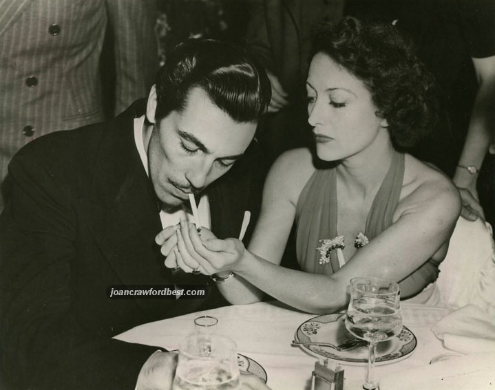 Circa 1939, with Cesar Romero.