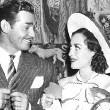 Joan and Gable, Sept. 20, 1936, on the set. Photographer Hyman Fink at left.