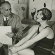 1927. Being sketched by vaudevillian and cartoonist Bert Levy.