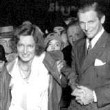 Joan, with Doug, putting her hand- and footprints outside Grauman's Theater. 9/14/29.