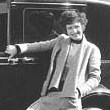 1929. Taking a break from shooting 'Our MM' to pose with her new car.