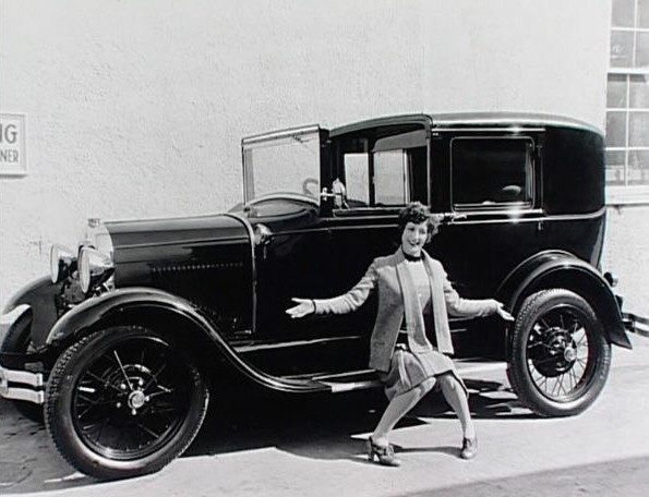 1929. On the set of 'Our Modern Maidens' with her new Model A Ford.