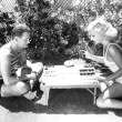 July 1931. Backgammon at home with Doug, Jr.
