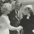 1933. With director Robert Z. Leonard and Anita Thompson of Dallas, who won a chorus-girl part in 'Dancing Lady.'