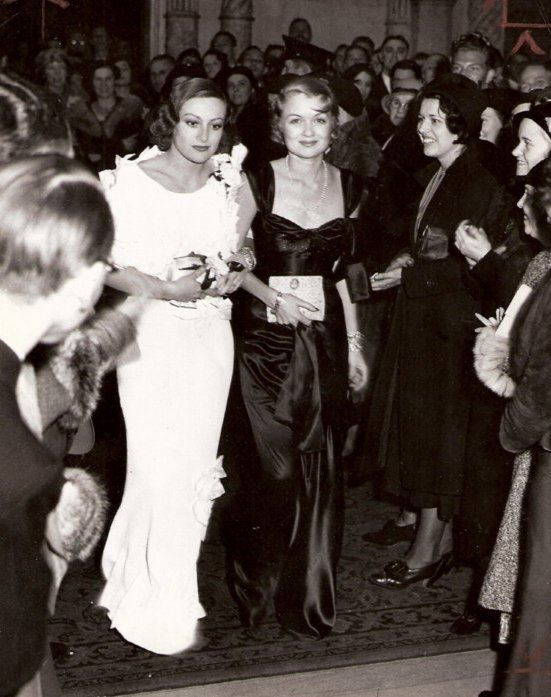 1932. With Constance Bennett, at LA's Biltmore Hotel.