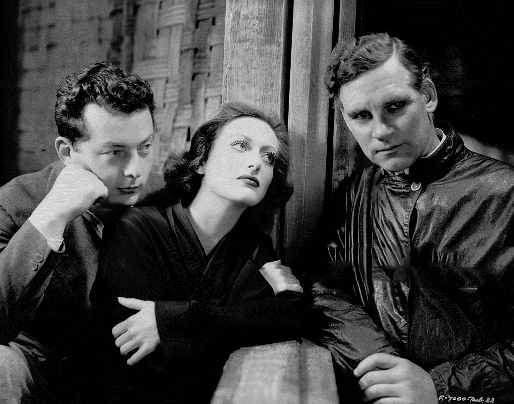 1932. Publicity on the set of 'Rain' with director Lewis Milestone (left) and Walter Huston.