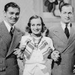 1934. On the set of 'Forsaking All Others.' With Gable, Montgomery, Billie Burke, and director Van Dyke.