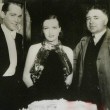 With Franchot Tone and director Clarence Brown. (Includes press caption.)