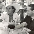 October 9, 1934, with Franchot Tone at the Ambassador Hotel's Lido pool.