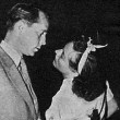 Rehearsing with Franchot Tone for the 7/27/36 Lux radio broadcast of 'Chained.'