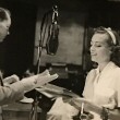 Rehearsing with Franchot Tone for the 7/27/36 Lux radio broadcast of 'Chained.'