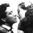 With Robert Taylor.