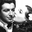 With Robert Taylor.