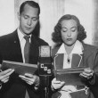 Publicity with Franchot Tone for the 7/27/36 Lux radio broadcast of 'Chained.'