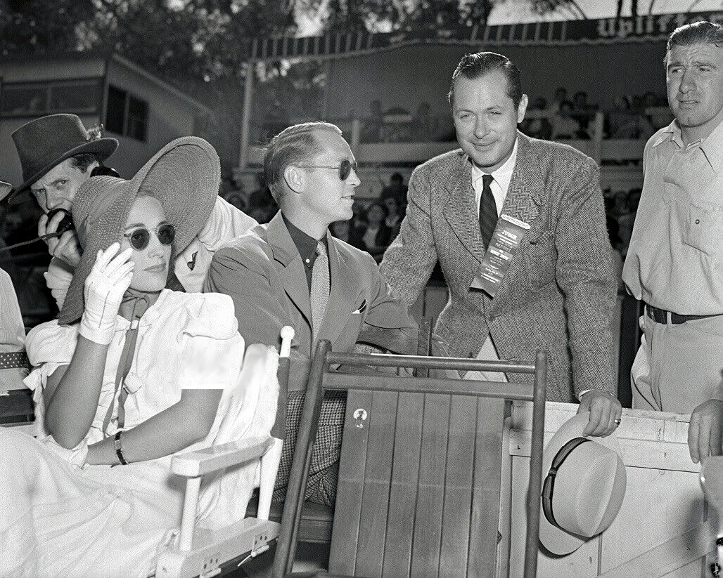 July 1938. At the Will Rogers Memorial Polo Field with husband Franchot Tone and Robert Montgomery.