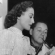 Three shots on the set of 'Mrs. Cheyney,' with director Boleslawski and Robert Montgomery.