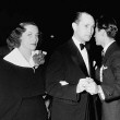 1936 with husband Franchot Tone and unknown.