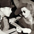 1938. At the races with husband Franchot Tone.