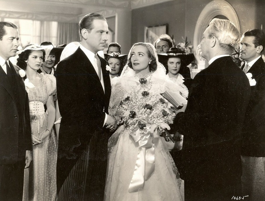 1938. 'The Shining Hour.' With Melvyn Douglas.