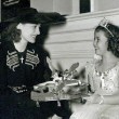 1938. On the set of 'Little Miss Broadway' with Shirley Temple.