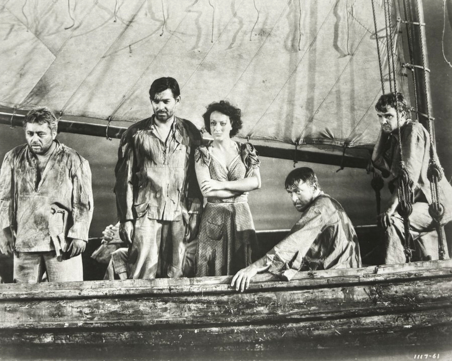1940. 'Strange Cargo' film still with Clark Gable, et al.