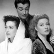 With Robert Taylor and Greer Garson.