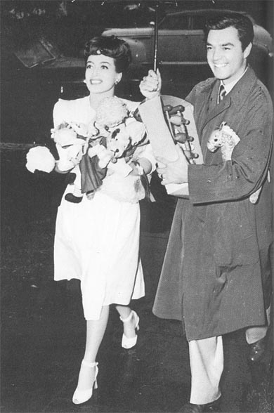 Christmas, 1943. With husband Phillip Terry.