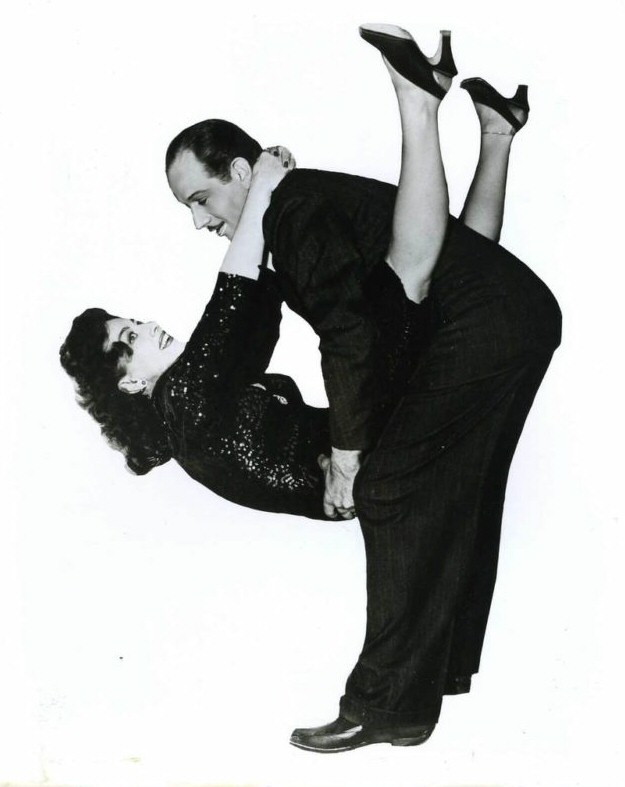 1942. 'They All Kissed the Bride' publicity with Melvyn Douglas.